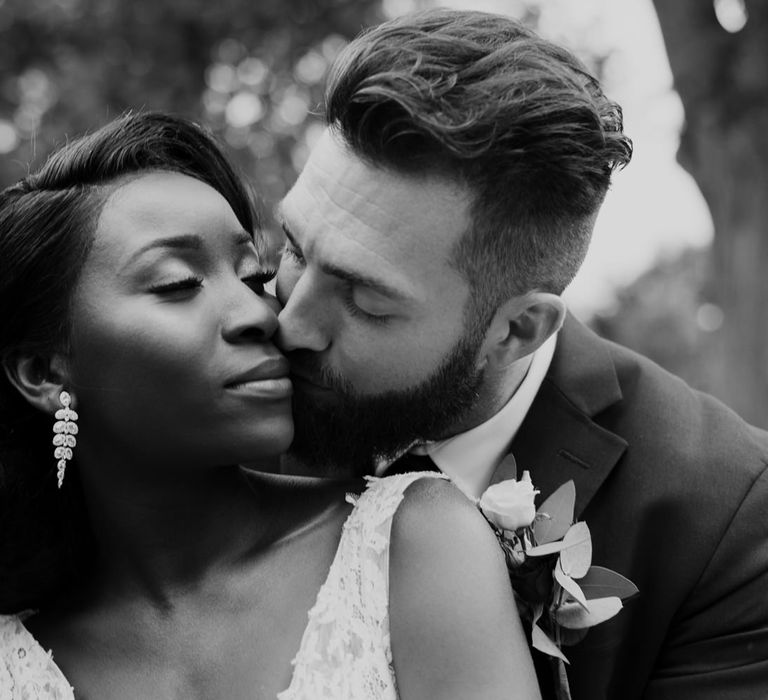 Intimate black and white bride and groom portrait 