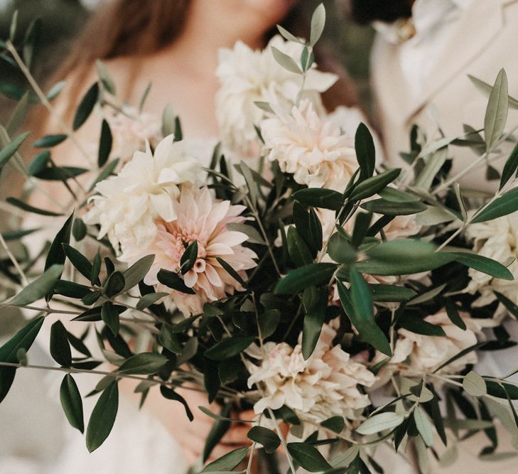 Close up of beautiful olive bouquet, olive branches and dahlia flowers