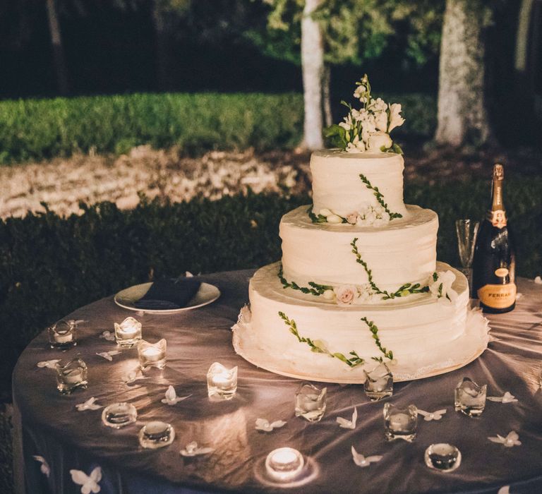 Tree tier white wedding cake for Tuscany Italy Wedding