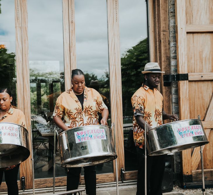 Steel drum band play at wedding at The Tythe Barn