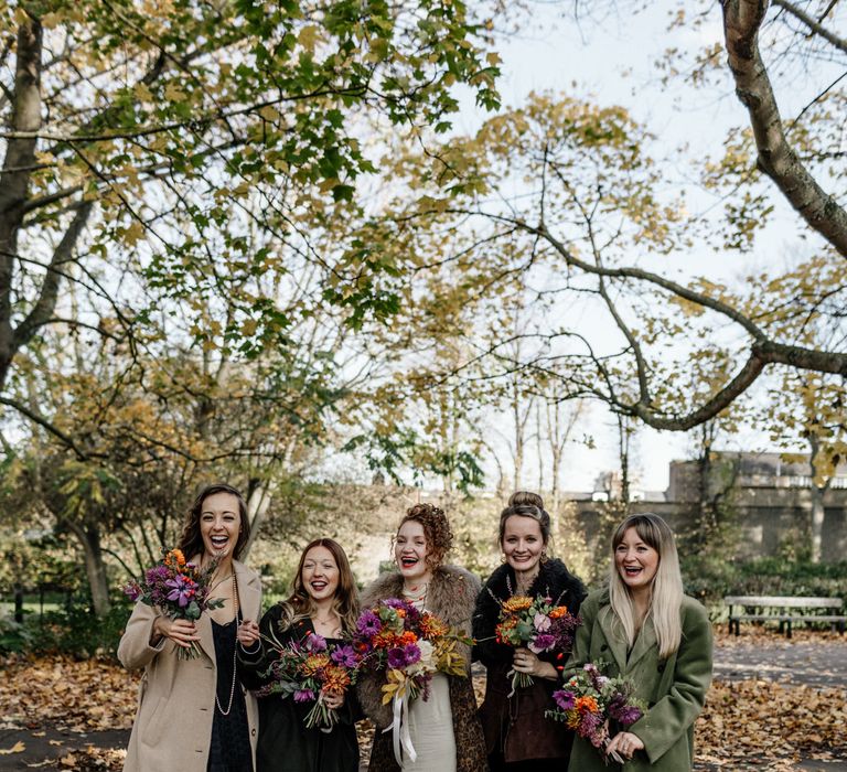 London pub wedding for beautiful couple with bright flowers