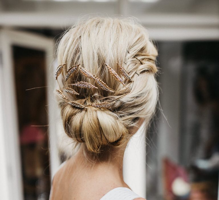 Blonde bride with pinned up wedding hairstyle 