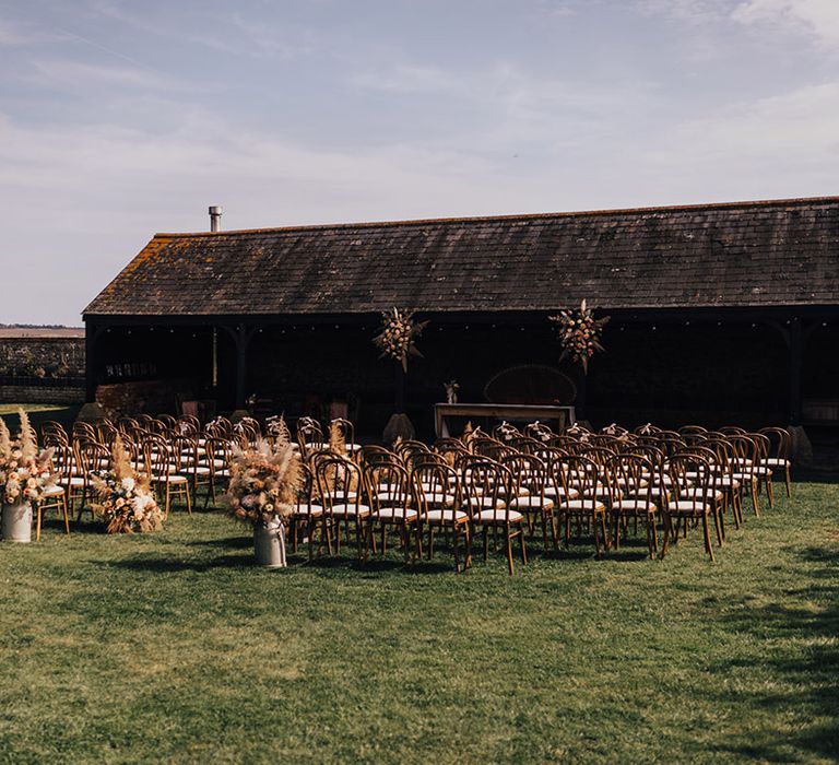 Barn wedding with Pampas grass installation 