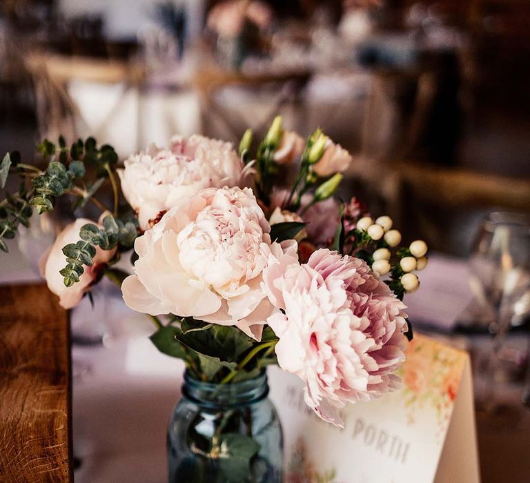 Beautiful pink wedding flower displays and table decor