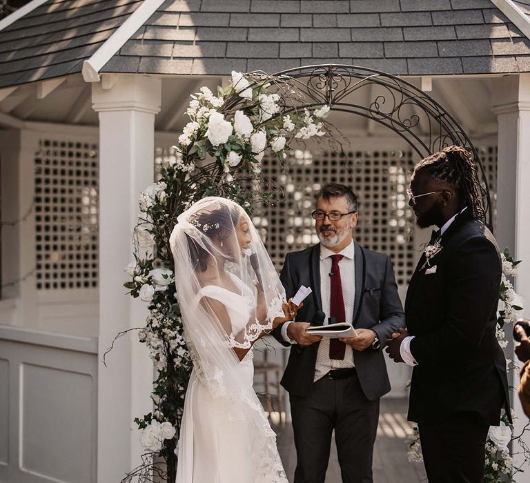 Bride reads her vows on her wedding day to her groom 