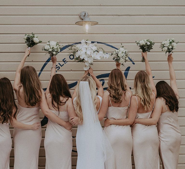 Champagne bridesmaid dresses captured by Isle of Wight wedding photographer