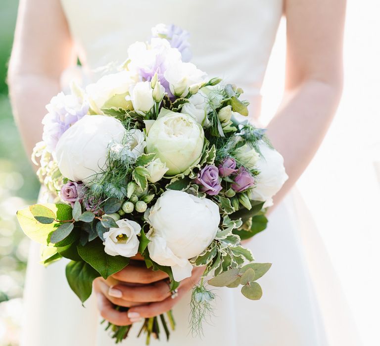 White and purple round wedding bouquet