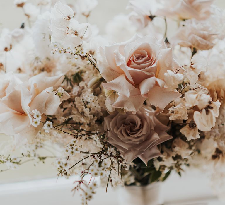 Pretty pink rose and white flower bridal bouquet