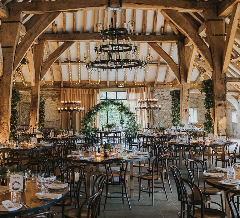 wedding reception room decorations at rustic barn wedding venue 