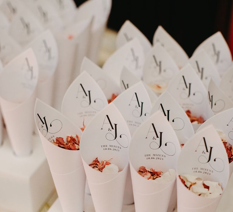 Personalised cones of confetti with the bride and groom's initials 