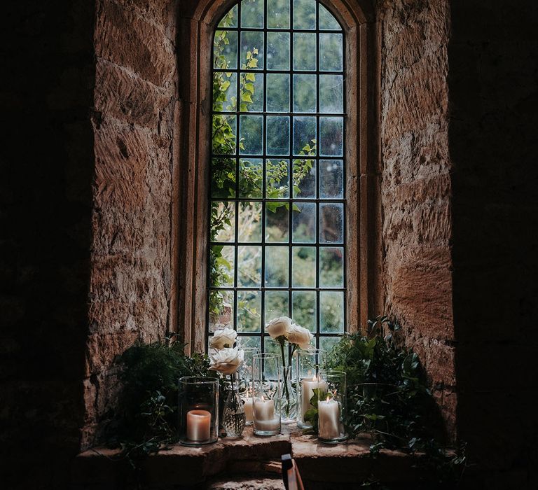 Brympton House country house wedding venue window with candles 