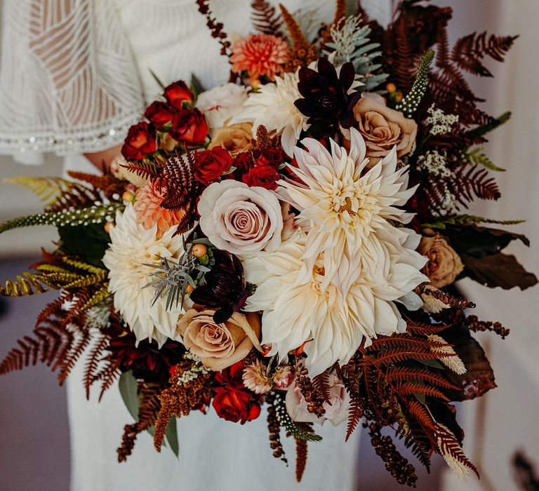 Autumnal bouquet with white and burnt orange florals