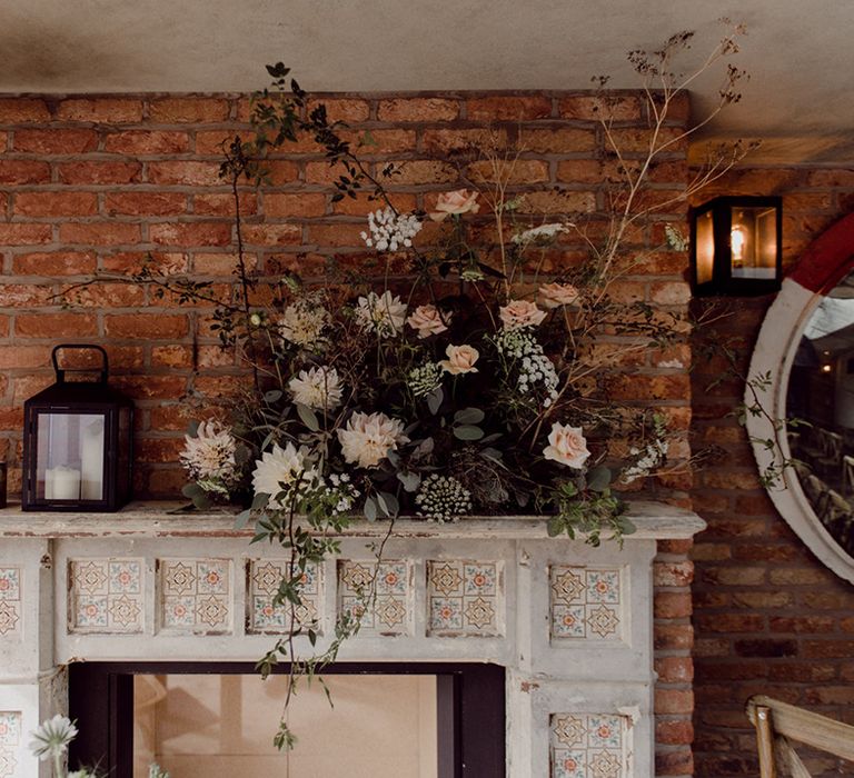 Baby's breath, dahlias and rose wedding flower arrangement