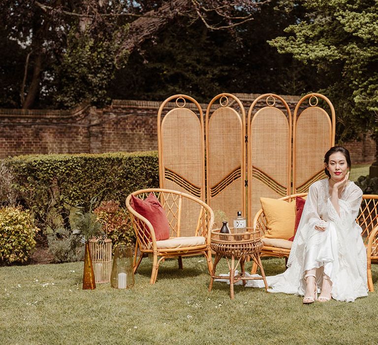 Japanese wedding inspiration with bamboo furniture and East Asian bride in a lace Kimono-style dress 