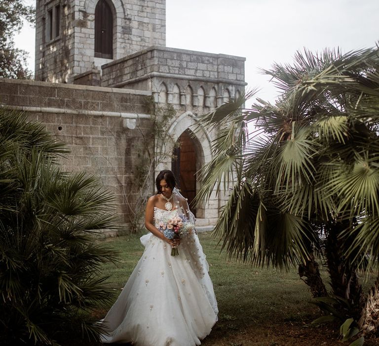 Tuscany wedding villa with the bride wearing a strapless princess wedding dress 