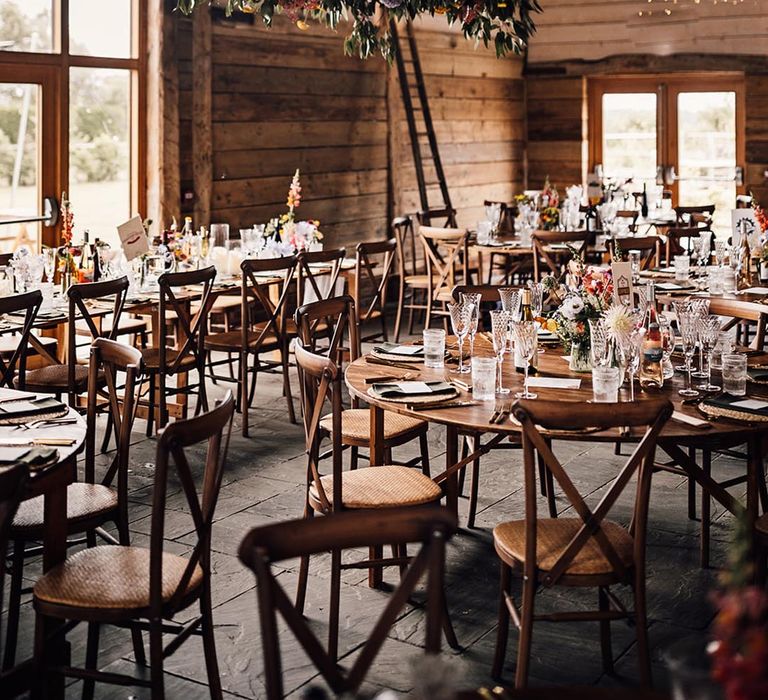 The Cherry Barn in Rye wedding venue decorated with botanical wildflowers 