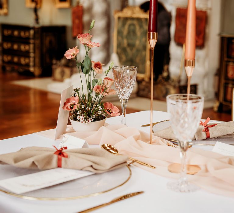 Dark red, orange and gold wedding table decorations