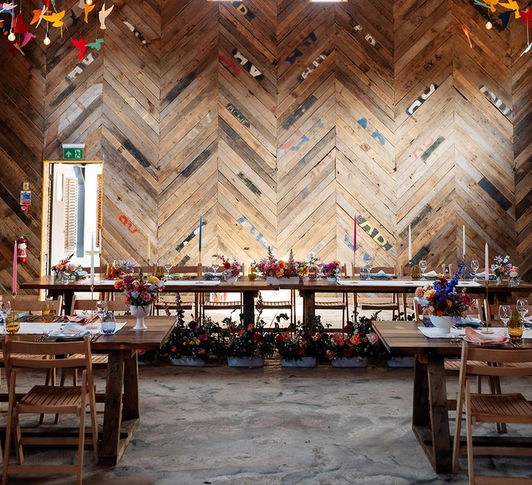 Colourful crane decorations at The Canary Shed wedding venue in Essex 