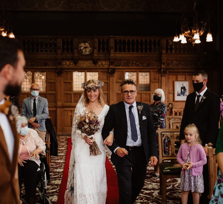 Wedding ceremony bridal entrance in boho wedding dress