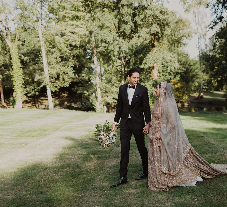 Bride and groom portrait holding hands by Phoebe Jane Photography 