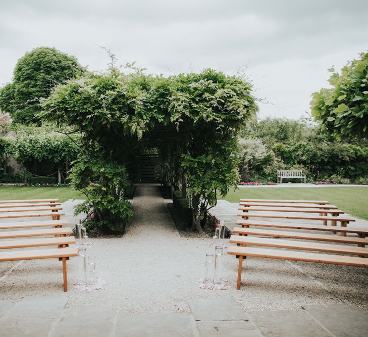 Outdoor ceremony benches at The Tythe barn