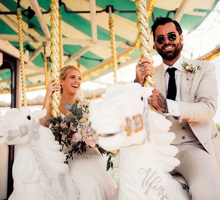 Bride and groom enjoy a ride at Preston Court wedding venue in Kent