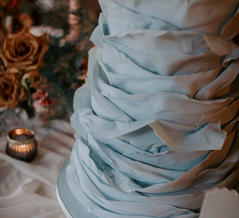 blue ruffle wedding cake design by Poppy Pickering Cakes 