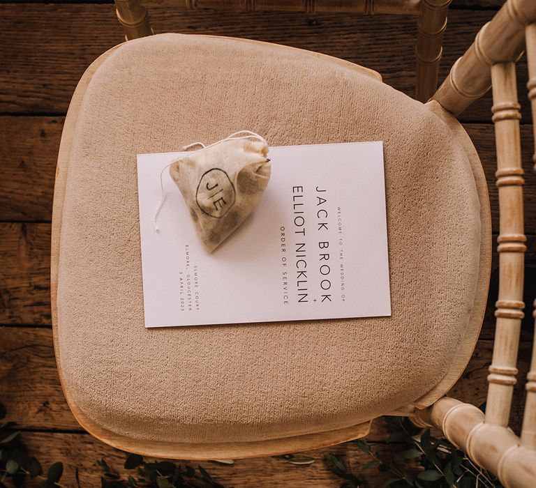 Monochrome minimalist black and white wedding on the day stationery with pouch of confetti for guests to throw 