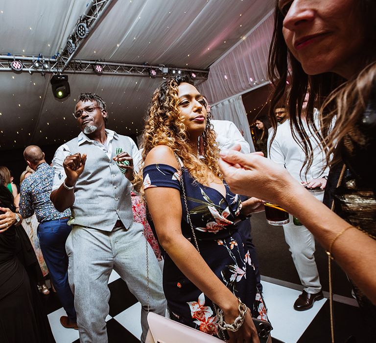 Jewish and Turkish wedding with the guests dancing and having a good time on the dancefloor 