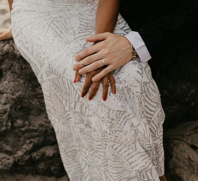 Bride in wedding dress with silver sequin pattern