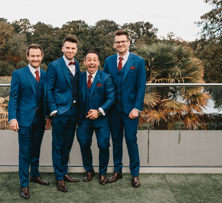 Groomsmen in navy suits at Millbridge Court autumn wedding