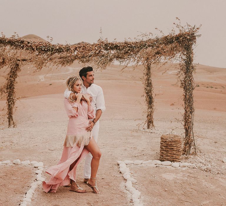 Bride and groom portrait in the Marrakech desert 