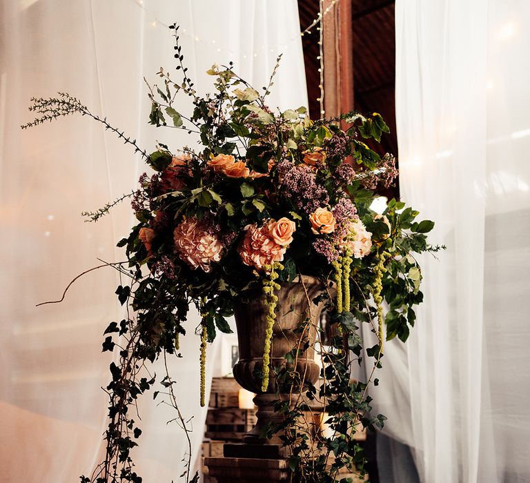 Stunning bloom decorations with peach and cream roses 