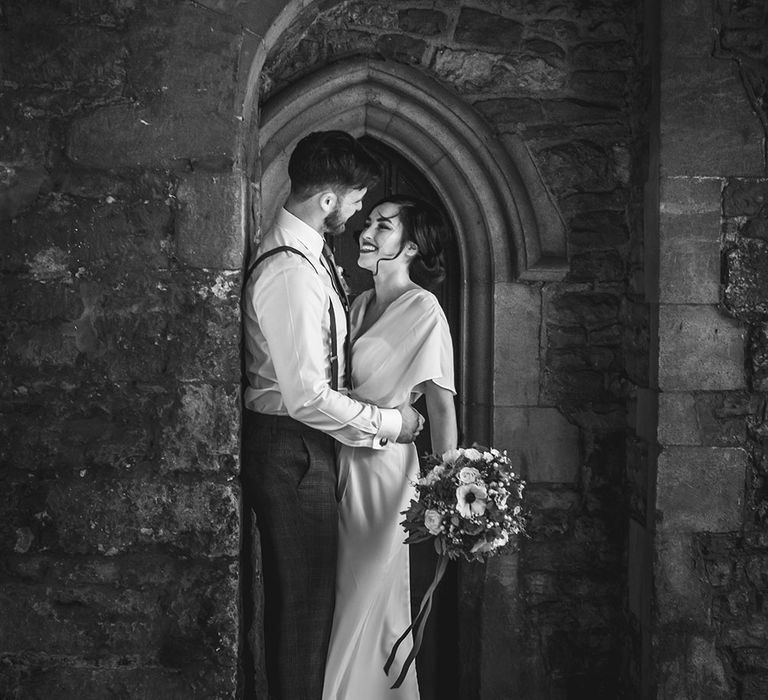 Bride and Groom in archway in Oxford