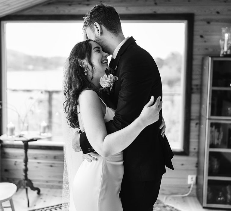 The bride and groom sharing their first dance at their destination wedding in Sweden