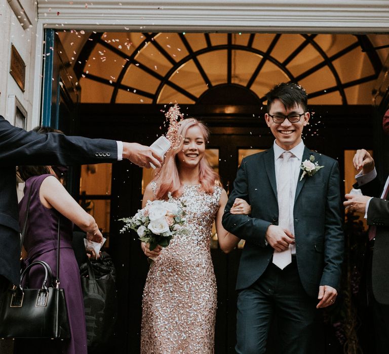 Chelsea Town Hall confetti exit with bride in a pink sequin wedding dress