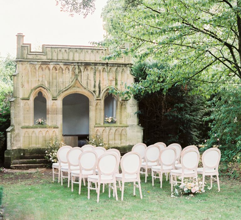 Intimate outdoor ceremony at Barnsley house for English garden party wedding