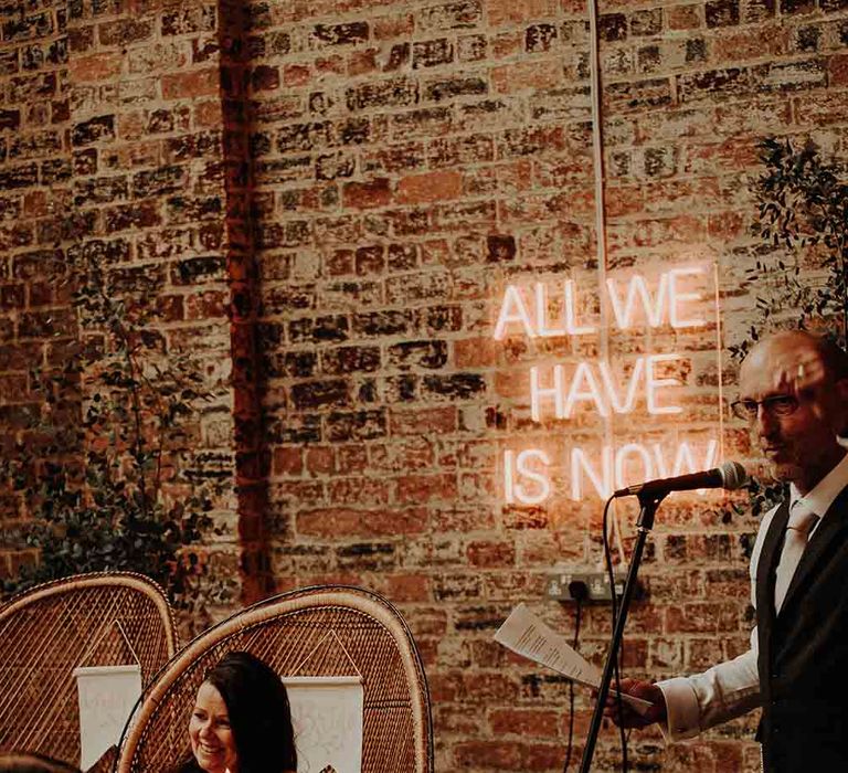 Neon wedding sign and retro stationery at industrial wedding