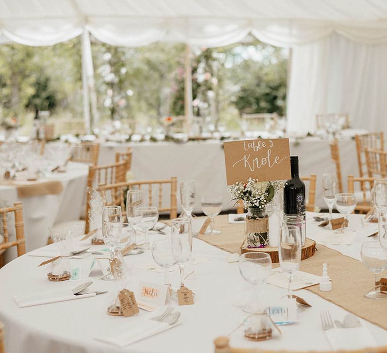 Christian wedding complete with marquee finished with classic styling and DIY florals 