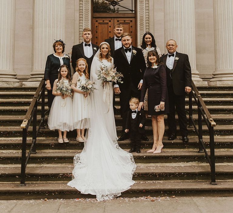 Intimate black-tie wedding at Old Marylebone Town Hal with Pronovias wedding dress and tuxedo 