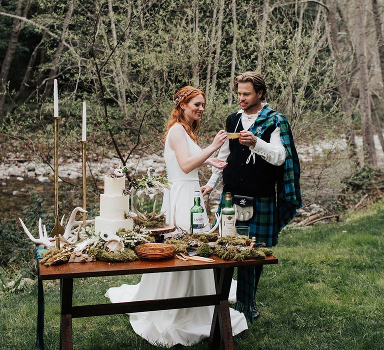 Highland blue and green wedding inspiration with boho wedding cake table 