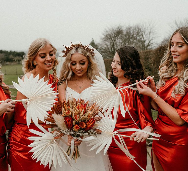 Dried flower bouquet for bride and palm leaf bouquet for bridesmaids