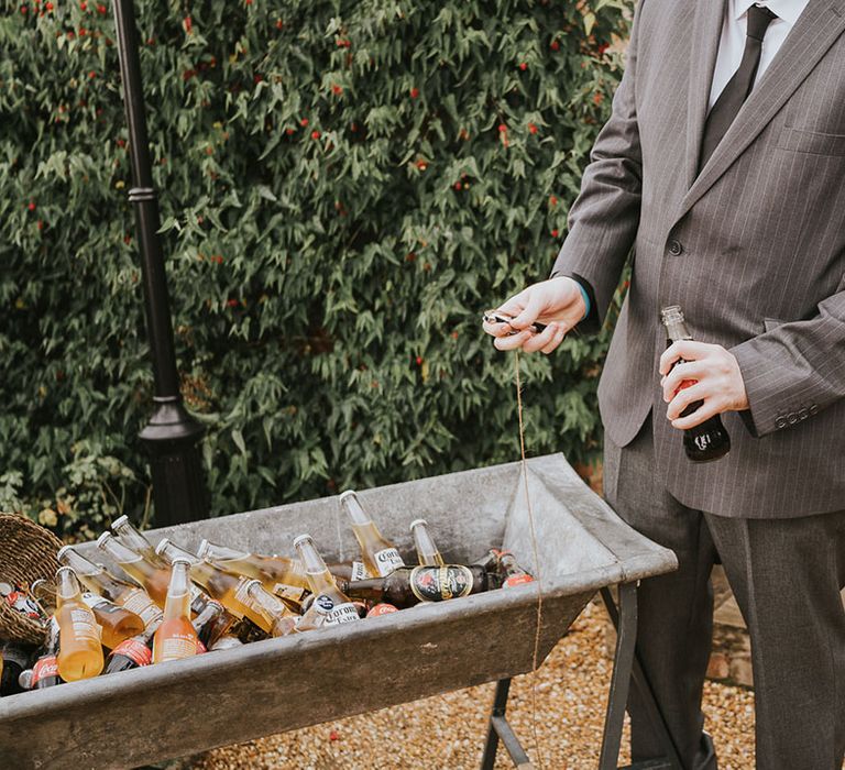 vintage ice troughs full of beer for the wedding guests to hydrate themselves with