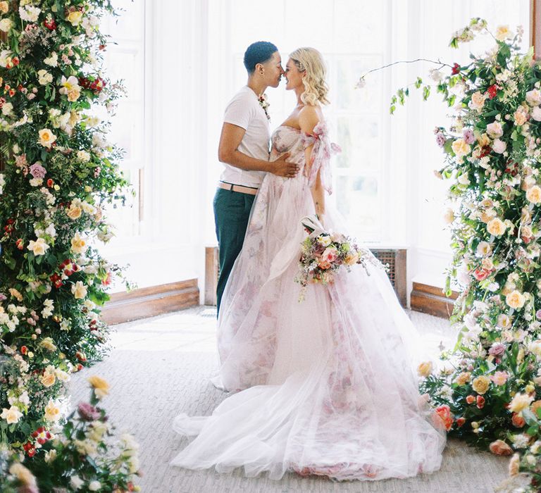 Barnett Hill Hotel wedding ceremony with column wedding flowers at the altar 