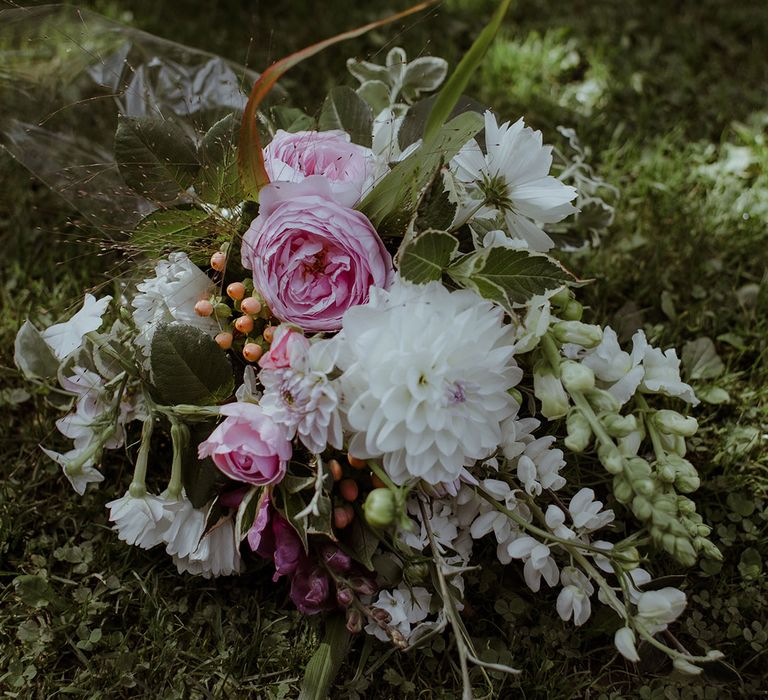 Pink and white wedding bouquet with roses, dahlias and stock for outdoor wedding 