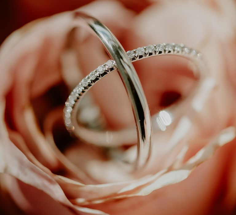 Silver diamond wedding band with plain silver wedding band in pink flowers 