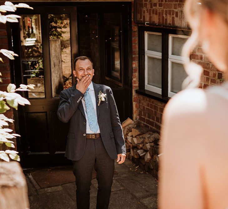 Brides father sees his daughter for te first time on the morning of her wedding day