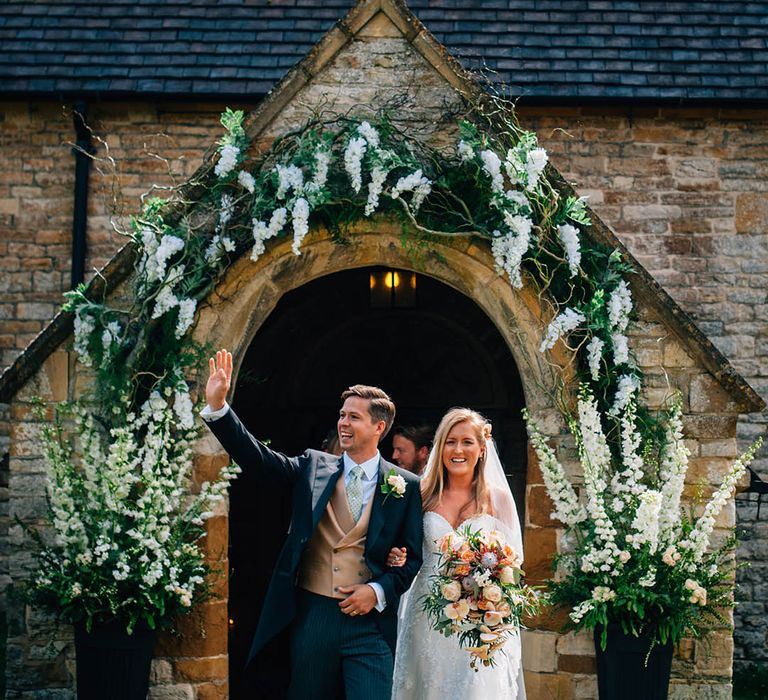 Church wedding flowers with traditional white and green colour palette 