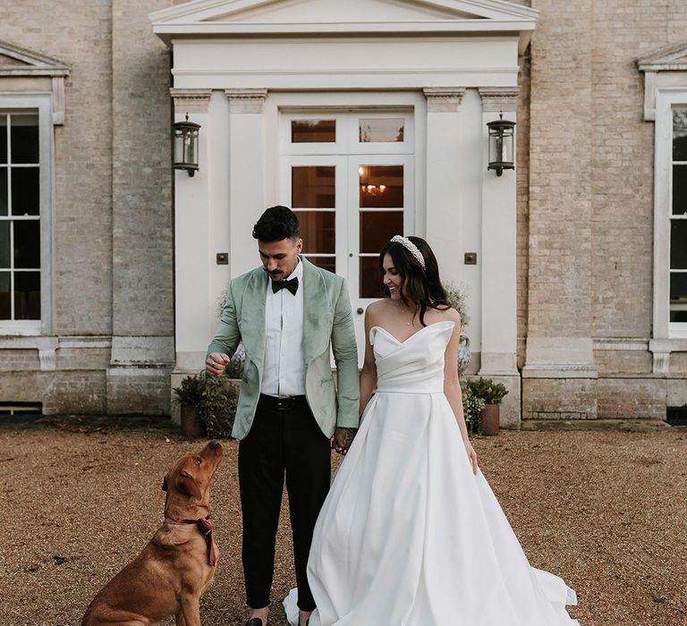 Christmas wedding at Ripple Court with the bride and groom with their pets dog ring bearer 