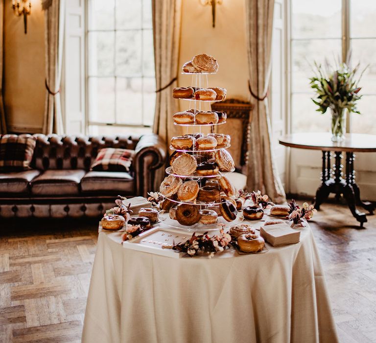 Doughnut tower with doughnuts from Crosstown Doughnuts at country house wedding 